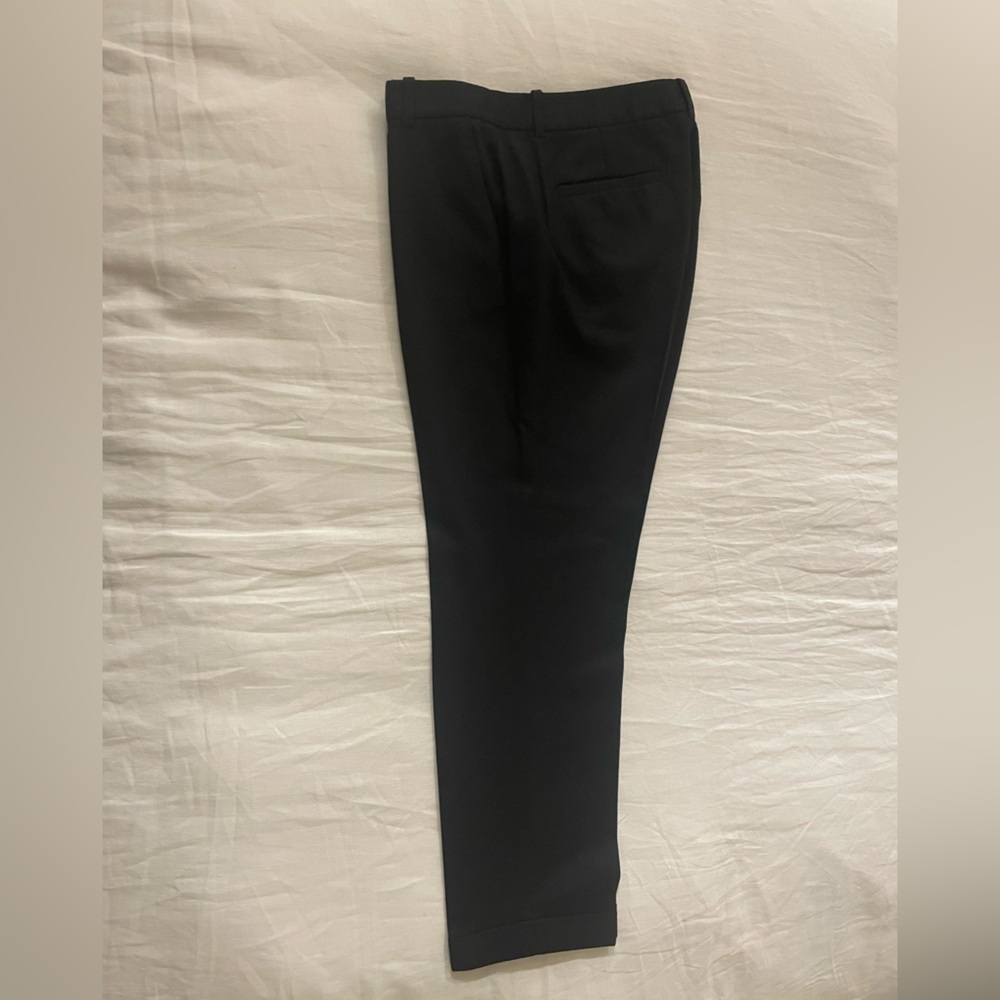 Black wool cuffed trousers. J Crew, cropped design. Worn, but good condition. 6.